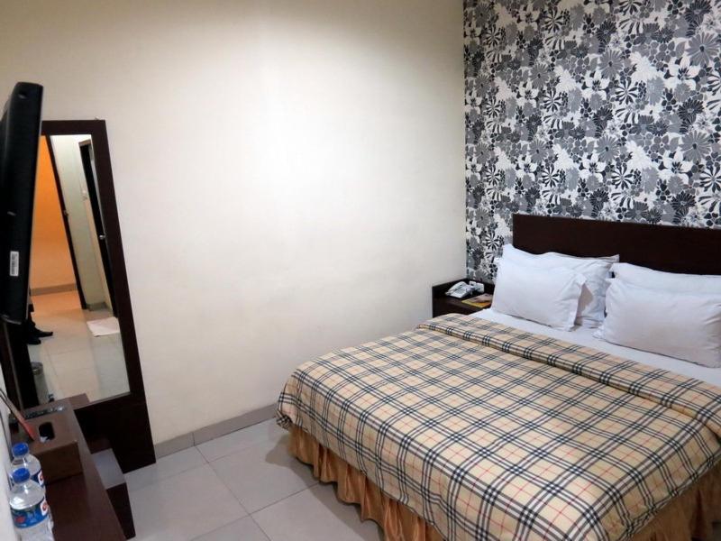 Vindhika Hotel Makassar Rum bild